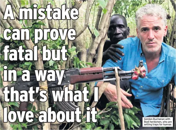  ??  ?? Gordon Buchanan with Bodi herdsmen, who are setting traps for hyenas