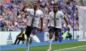  ?? Photograph: Nick Potts/PA ?? Mason Holgate (left) celebrates with Everton teammate Alex Iwobi after regaining the lead over Leicester City.