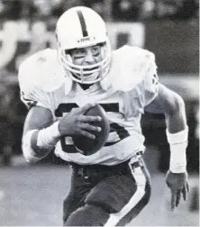  ?? Associated Press 1986 ?? Stanford tailback Brad Muster (25) was a rock on teams in the 1980s before going on to play seven years in the NFL.