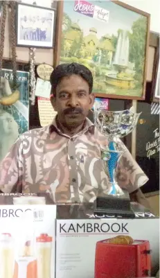  ?? Photo: Charles Chambers ?? Lautoka golfer Gaffar Ali with some of the prizes at stake today.