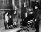  ?? ?? A scene from Charlie Chaplin’s 1952 film Limelight featuring Michael, Josephine, and Geraldine Chaplin. Charlie is in the background. Photograph: Bettmann Archive