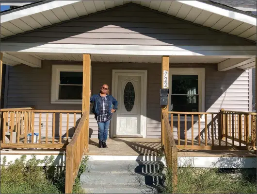  ?? (AP/Ben Finley) ?? Karen Speights stands on the porch of her 1920s craftsman house Oct. 7 in Norfolk, Va.