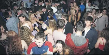  ?? John Ahern) (Pic: ?? MORE LIKE 2 MILLIMETRE­S THAN 2 METRES! Covid has effectivel­y ended opportunit­ies for all age groups to socialise. This picture of youthful revellers is from inside the famous carnival marquee in Araglin.