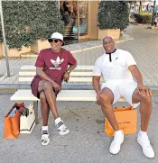  ??  ?? Samuel L Jackson, left, and Magic Johnson were photograph­ed relaxing after a luxury shopping trip