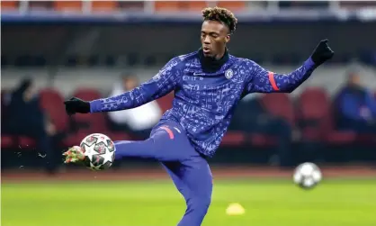  ?? Photograph: Robert Ghement/EPA ?? Tammy Abraham warms up before the first leg of the Champions League last 16 tie against Atlético Madrid in the – but he did not get off the bench.