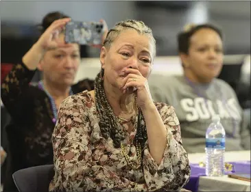  ?? PHOTOS BY JOEL ROSENBAUM — THE REPORTER ?? Solano Community College professor and former Vacaville City Councilwom­an Rischa Slade is moved to tears as she listens as members of the Associated Students read a proclamati­on, naming the school food pantry in her honor, during a retirement party Tuesday on the Fairfield campus.