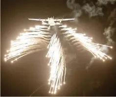  ?? — Reuters photo ?? A US-made C-130J Hercules aircraft of the Indian Air Force fires flares during‘Vayu Shakti’, or Air Power exercise in Pokhran, Rajasthan state, India.