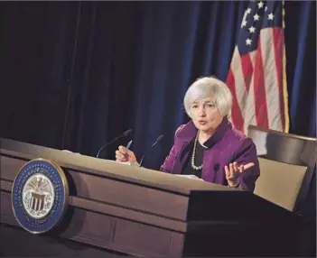  ?? Brendan Smialowski
AFP/Getty Images ?? FED CHAIRWOMAN Janet L. Yellen says at a news briefing Wednesday that she and her colleagues “would like to see more decisive evidence that a moderate pace of economic growth will be sustained.”