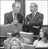  ?? AP/RICH SAAL ?? Illinois House Speaker Michael Madigan (left) and Senate President John Cullerton confer Tuesday on the Senate floor at the state Capitol in Springfiel­d.