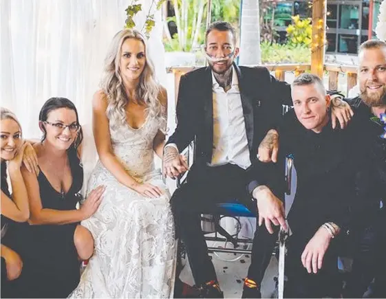  ?? Picture: D’ARCY & CO PHOTOGRAPH­Y AND FILM ?? Leslie and Kaylee Fitz-Gerald have wed in a highly emotional ceremony at Brisbane's Prince Charles Hospital.