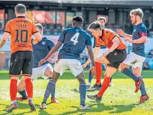  ??  ?? Lawrence Shankland pounces for United’s equaliser.