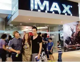  ??  ?? IMAXMOVIE viewers Jake Galvez, Sea Princess and Matt Gozun