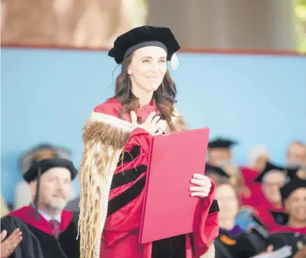  ?? Photo / Kris Snibbe ?? Prime Minister Jacinda Ardern’s remarks on NZ’s military-style weapon ban drew a long, loud standing ovation at Harvard University.