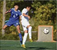  ?? H John Voorhees III / Hearst Connecticu­t Media ?? Abbott Tech’s Santiago Idrobo (6) and New Milford’s Yousef Eltoukhy (22) fight for position.