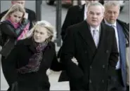  ?? JESSICA HILL — THE ASSOCIATED PRESS FILE ?? In this file photo, former Connecticu­t Gov. John Rowland, right, and his wife, Patty, arrive at federal court in New Haven, Conn. The U.S. Supreme Court has declined to hear Rowland’s appeal of his conviction­s for conspiring to hide his work on two...