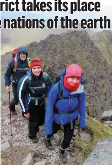  ??  ?? Climbers on Carrauntoo­hil, part of the Reeks District.