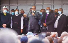  ??  ?? Former South African president Jacob Zuma speaks to supporters who gathered at his home, as the court agreed to hear his challenge to a 15-month jail term for failing to attend a corruption hearing, in Nkandla, yesterday.