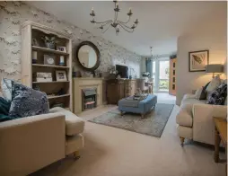  ?? ?? McCarthy Stone developmen­ts offer beautiful interiors, sweeping views and charming gardens LEFT Mrs and Dr Learner have happily relocated to Llys Isan in Cardiff