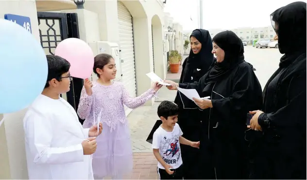  ??  ?? ↑
A Sharjah charity celebrates Emirati Children’s Day.