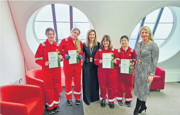  ?? ?? BOOST: Shell scholarshi­p winners Emily Pugh, Cerys Robertson, Samantha Witcomb and Bing Lin with Claire Davidson and Pauline McGeevor.