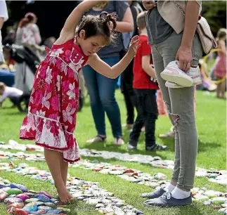  ?? PHOTO: DAVID UNWIN/STUFF ?? Indiana Howell, 5, balances between the rocks at a Palmy Rocks event.