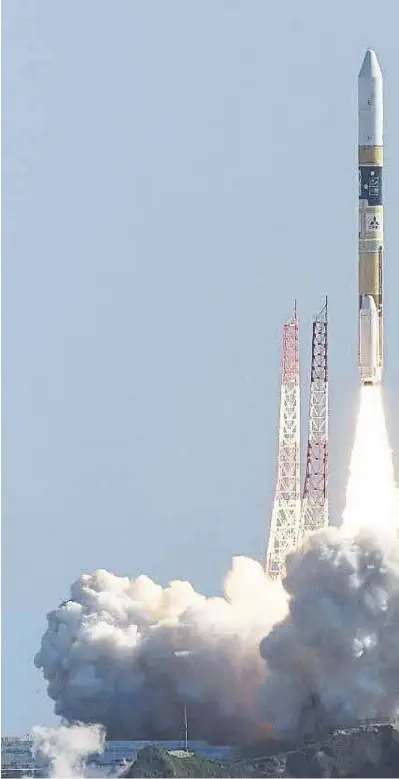  ?? ?? A H-IIA rocket carrying a lunar surface probe was launched by Japan on Thursday. Neil Armstrong, inset