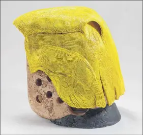  ?? CONTRIBUTE­D PHOTO ?? Sculpted clay and brick was what U.s.-born artist Nancy Roberts needed to fashion her take on President Donald Trump. Her work – complete with combover hairdo – will be on display at Visual Voice Fine Art in Truro.