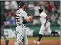  ?? TONY DEJAK — THE ASSOCIATED PRESS ?? Tigers relief pitcher Michael Fulmer waits as Franmil Reyes runs the bases after his solo home run during the sixth inning April 9at Progressiv­e Field.