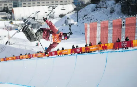  ?? PHOTOS: MARTIN BUREAU/AFP/GETTY IMAGES ?? Canada’s Cassie Sharpe competes in the women’s ski halfpipe final during the Pyeongchan­g 2018 Winter Olympic Games on Feb. 20. Canada had skiers at fifth and sixth in men’s halfpipe and had other close calls in men’s and women’s ski slopestyle.