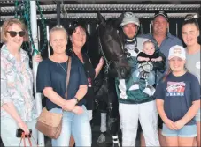  ?? Picture: CLAIRE WESTON PHOTOGRAPH­Y ?? SALUTE: Uptown Lad with owners, from left, Tracey Plush, Kristy Van Ryn and Helen Friend, driver Leigh Sutton, trainer David Van Ryn and family.