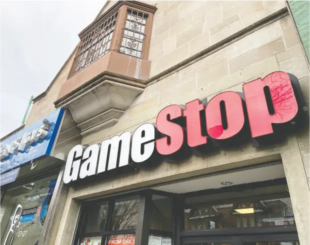  ?? NICK ZIEMINSKI / REUTERS ?? Gamestop Corp., a struggling video-game retailer, was previously among the most heavily shorted. But it became the poster child
for the “meme stock” phenomenon — its stock eventually hitting an all-time high of US$483 on Jan. 28.