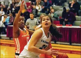  ?? JEFF GILBERT / CONTRIBUTE­D ?? Fairmont’s Madeline Westbeld finished with a double-double — 12 points and 11 rebounds — as the Firebirds beat Mercy McAuley 40-31 in a regional semifinal at Princeton High School on Wednesday.