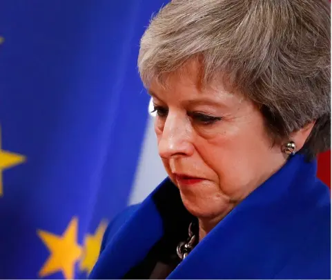  ?? PHOTO: ALASTAIR GRANT/AP ?? Theresa May faces a tough task to get her draft Brexit deal endorsed by a majority of British MPs.