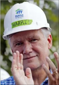  ?? CHUCK BURTON — THE ASSOCIATED PRESS FILE ?? In this file photo Republican congressio­nal candidate Mark Harris applauds during a Habitat For Humanity building event in Charlotte, N.C.