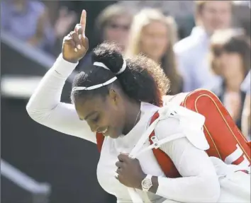  ?? Associated Press ?? Serena Williams came back from a loss in the first set to defeat Camila Giorgi Tuesday and reach the semifinals at Wimbledon for the 11th time.