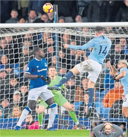  ??  ?? Aymeric Laporte heads Manchester City into the lead at Everton.
