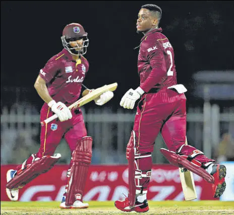  ?? AP ?? The 218-run partnershi­p between Shimron Hetmyer (right) and Shai Hope is West Indies’ second highest stand against India in ODIS.