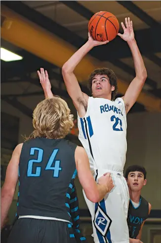  ?? Staff photo by Jerry Habraken ?? Redwater’s Brandon Brocks shoots during a game against Union Grove in the James Bowie Classic on Thursday afternoon at James Bowie High School in Simms, Texas.