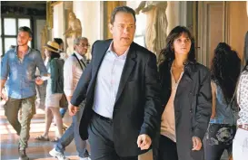  ?? SONY ?? TomHanks as Robert Langdon and Felicity Jones as Sienna Brooks pair up in “Inferno,” the third in a series based on the popular books by Dan Brown.