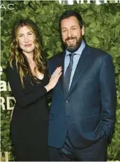  ?? EVAN AGOSTINI/INVISION ?? Adam Sandler, seen Nov. 28 with wife Jackie, will receive the Mark Twain Prize at a March gala.