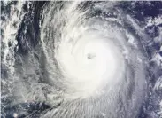  ?? NASA ?? A NASA satellite image shows the powerful Typhoon Phanfone in the western Pacific Ocean.