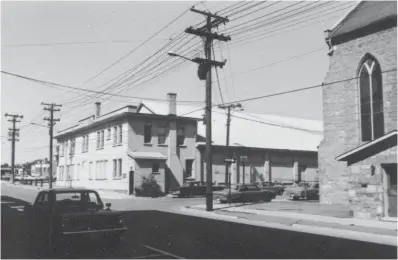  ?? COURTESY OF GUELPH PUBLIC LIBRARY ?? Above:
The Victoria Curling Rink, as seen from Quebec Street, 1968.