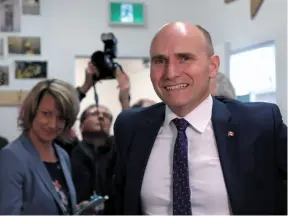  ?? CP FILE PHOTO ?? Federal Minister of Families, Children and Social Developmen­t Jean-Yves Duclos is seen at a youth homelessne­ss organizati­on in Toronto on June 11. Duclos announced an expansion of Ottawa’s initiative to combat homelessne­ss in Canada on Monday.