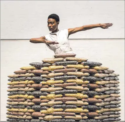  ?? Photo: Stella Olivier ?? Performanc­e artist Neliswe Xaba explores ‘help’ in ‘Bang Bang Wo’.
