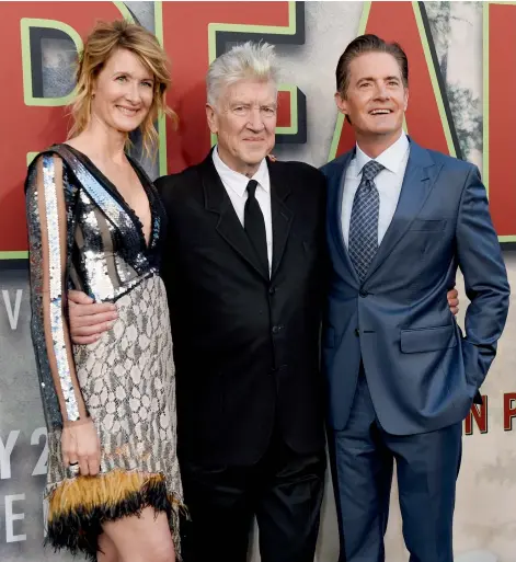  ??  ?? David Lynch, the co-creator, director and executive producer of Twin Peaks, poses with cast members Laura Dern and Kyle MacLachlan