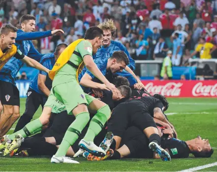  ?? Picture: AFP ?? Croatia players celebrate winning their penalty shootout against Russia in yesterday’s World Cup quarter-final.