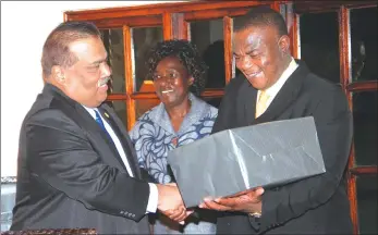  ?? — (Picture by John Manzongo) ?? Zimbabwe Defence Forces Commander General Constantin­o Guvheya Dominic Nyikadzino Chiwenga exchanges gifts with Utara University Vice Chancellor Professor Dato Seri Dr Mohamed Mustafa Ishak during a dinner in Harare on Thursday.