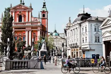  ?? CAMERON HEWITT/RICK STEVES’ EUROPE ?? The architectu­re of Ljubljana, the capital of Slovenia, reflects a mixture of Germanic, Mediterran­ean and Slavic cultures.
