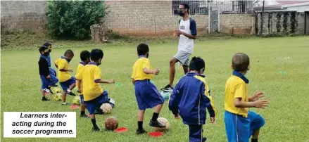  ?? ?? Learners interactin­g during the soccer programme.