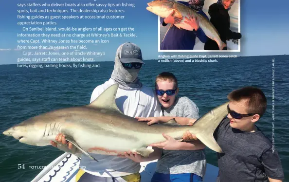  ??  ?? Anglers with fishing guide Capt. Jarrett Jones catch a redfish (above) and a blacktip shark.